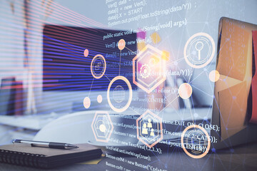 Multi exposure of desktop computer and technology theme hologram. Concept of software development.