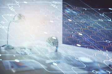 Double exposure of desktop computer and technology theme hologram. Concept of software development.