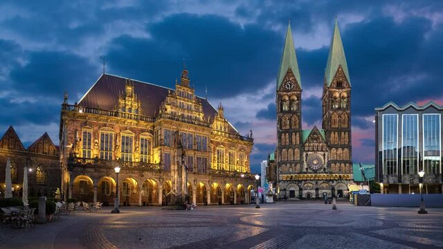 Bremen, Germany. Panorama of Market square at dusk with buildings of Town Hall and Cathedral (static image with animated sky)
