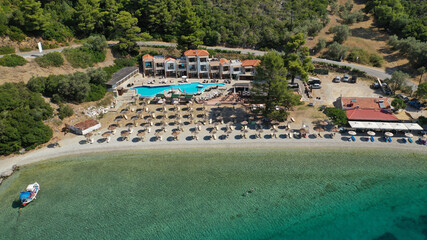 Aerial drone photo of famous crystal clear turquoise beach and bay of Panormos a popular safe sail boat anchorage in island of Skopelos, Sporades, Greece