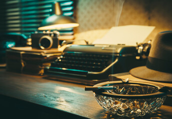 Vintage film noir office desk with old typewriter