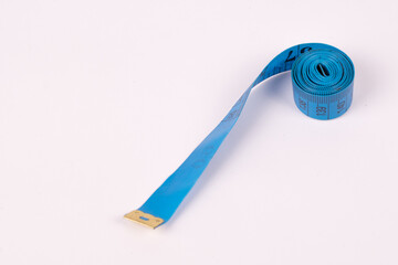 blue centimeter tape on white background