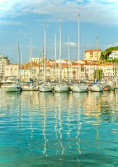 A row of yachts in Cannes Harbour