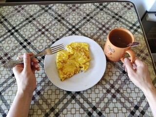 Eating omelette first person photo