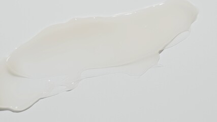 a smudge of facial cream with golden particles in it on white. Cosmetics smudge top view