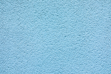 pattern of blue painted plaster wall
