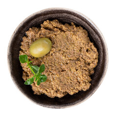 Tapenade - olive paste made from green olives. Spreadable green olive cream in bowl isolated on white.