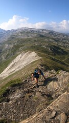 young man hiking a mountain