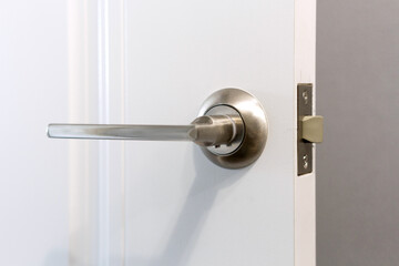 Naklejka premium white door with a doorhandle