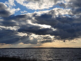 Fototapeta na wymiar clouds over the lake