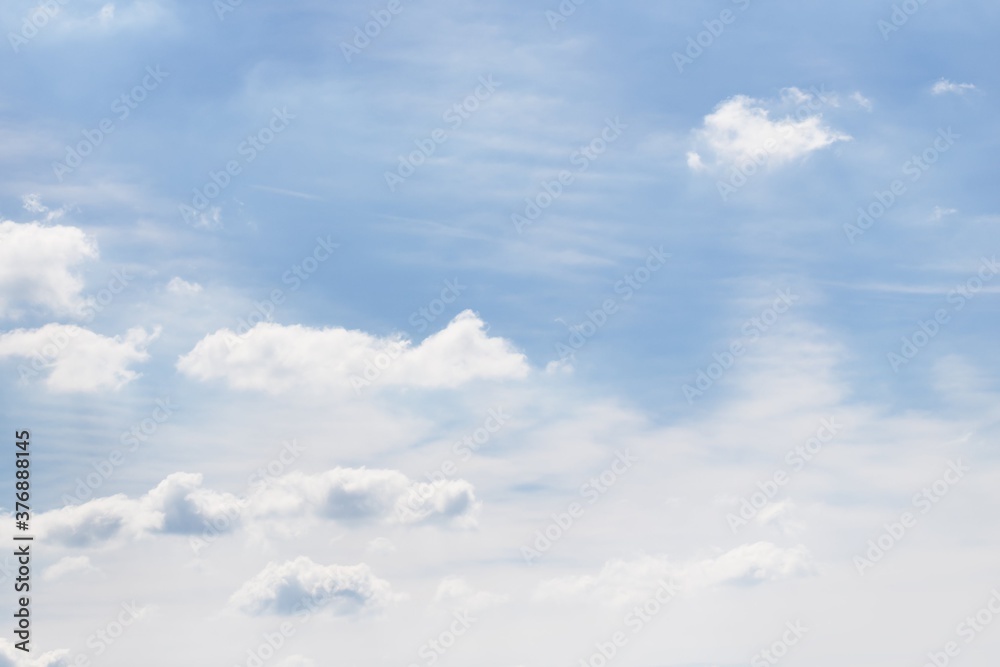 Wall mural Light sky background. Clouds in the blue sky