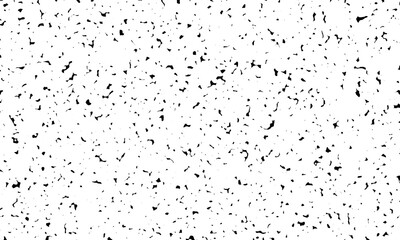 spotted grunge white background with chaotic black spots, dots, litter, small scraps on a light background. Simple primitive traditional universal background