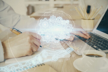 Obraz premium Businessman working on Laptop with technology theme drawing. Concept of big data. Double exposure.