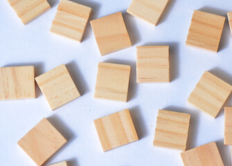 Wooden blocks on a white table.