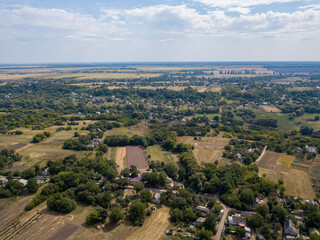 Fototapeta premium Agricultural village in Ukraine. Aerial drone view.