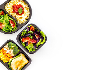 Food delivery background. Take away meal in boxes. Top view