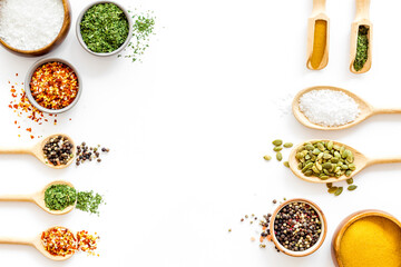 Herbs spices and flavoring on kithen desk, top view