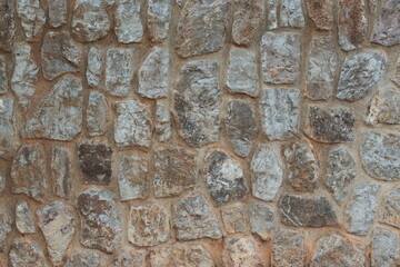 Stone wall texture, masonry, close up, copy space.