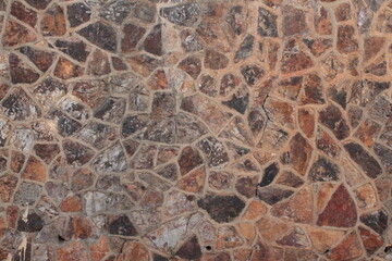 
Stone wall built with stones of different sizes