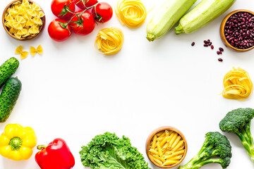 Cooking frame background with vegetables - flat lay from above