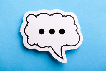 Chat Speech Bubble Isolated On Blue Background