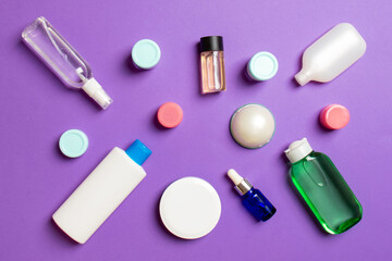 Group of plastic bodycare bottle Flat lay composition with cosmetic products on colored background empty space for you design. Set of White Cosmetic containers, top view with copy space