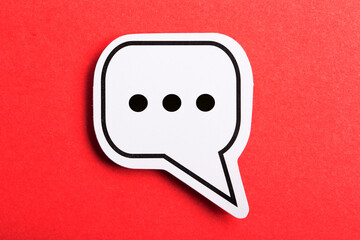 Chat Speech Bubble Isolated On Red Background
