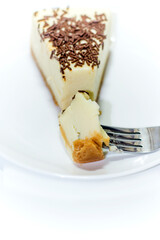 Portion of delicious chocolate cake on white background