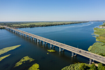 Fototapeta na wymiar The Antonovsky bridge in Kherson city aerial view.