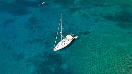 Aerial drone photo of picturesque fishing village of Gerolimenas with crystal clear emerald sea and traditional Lakonian architecture, Mani peninsula, Peloponnese, Greece