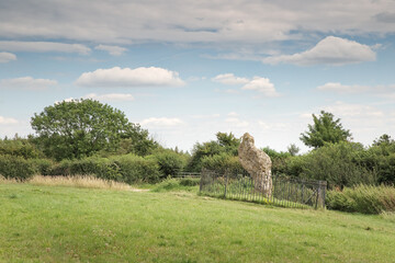 landscape image of the standing stone in the countryside
