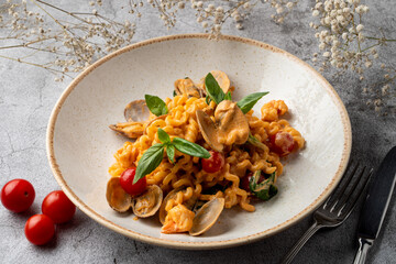 Mussel pasta with creamy sauce, menu photo with artificial light