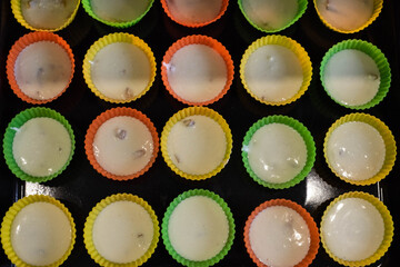 Baking cupcakes in the oven. Home cooking