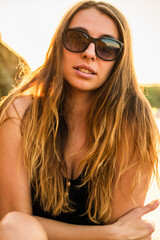Close up portrait of lovely blond woman. Pretty happy lady enjoying summer outdoors. Positive emotion life success mind peace concept