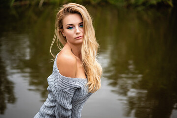 Close-up portrait of a sensual blonde outdoor