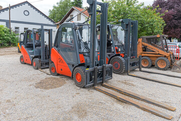 Many Forklifts Outside