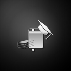 Silver Graduation cap and book icon isolated on black background. Long shadow style. Vector.