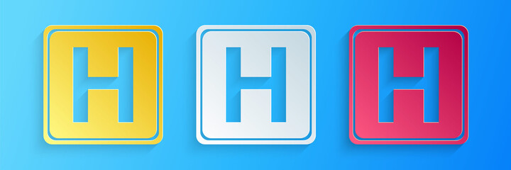 Fototapeta premium Paper cut Hospital sign icon isolated on blue background. Paper art style. Vector.