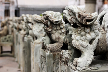 Obraz premium stone carved lion statue