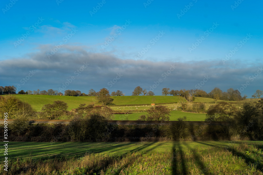 Poster path, footpath, track, trail in the english countryside. for walking, hiking, rambling and trekking.