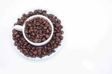 coffee beans in a cup top view