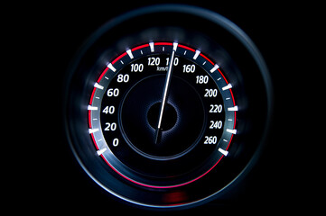 140 Kilometers per hour,light with car mileage with black background,number of speed,Odometer of car.