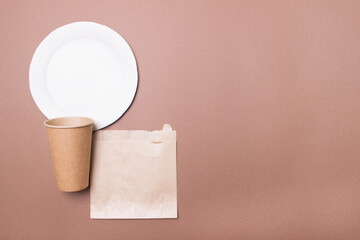 Eco friendly disposable tableware. Biodegradable craft dishes. Recycling concept. Also used in fast food, restaurants, takeaways, picnics. Close-up. Copy space