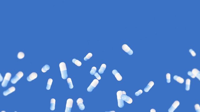 Flying many medical capsules on blue background. Medicine and pharmaceutical concept. 3D animation of white pill capsule rotating. Loop animation.