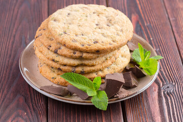 Oat cookies served on wooden table close up