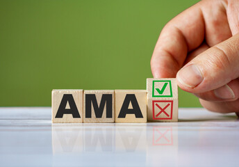 The hand turn wooden block with red reject X and green confirm tick as change concept of AMA. Word AMA conceptual symbol