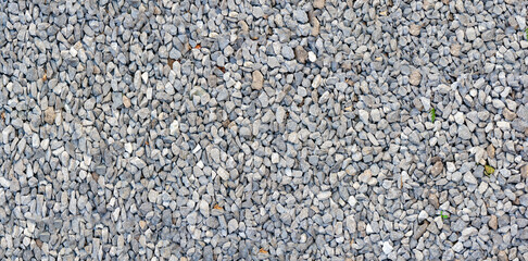 Obraz premium Light gray stone wall texture. Gray pebble dash panoramic background