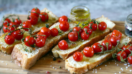 Bruschetta with olive oil and cherry tomatoes. Selective focus. Macro.