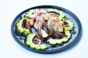 raw shrimp dressing spicy and sour fish sauce Thai food on plate