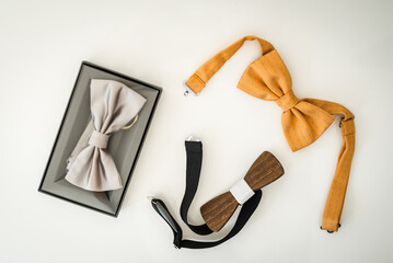 Variety of  bow ties isolated on white. Photo taken from above. Formal wear.